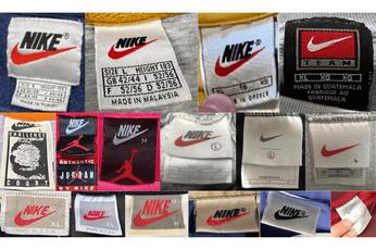 Nike white tag red swoosh sales